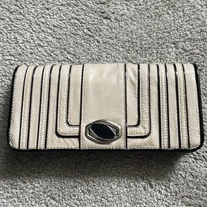 White House Black Market Clutch- never used!